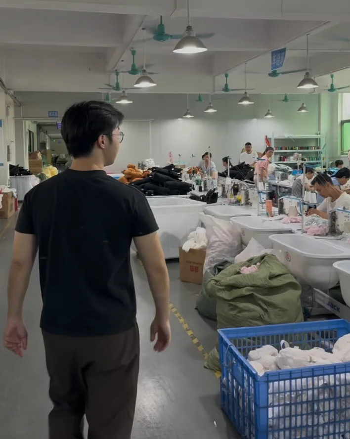 Peco visiting a garment factory production floor in China
